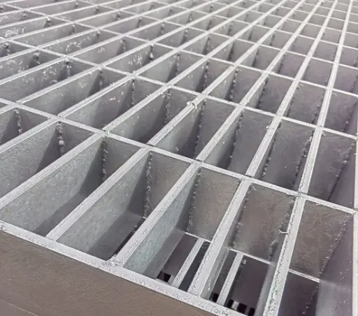 High-capacity heavy-duty drop-in steel grating engineered for extreme loads in ports and factory environments.