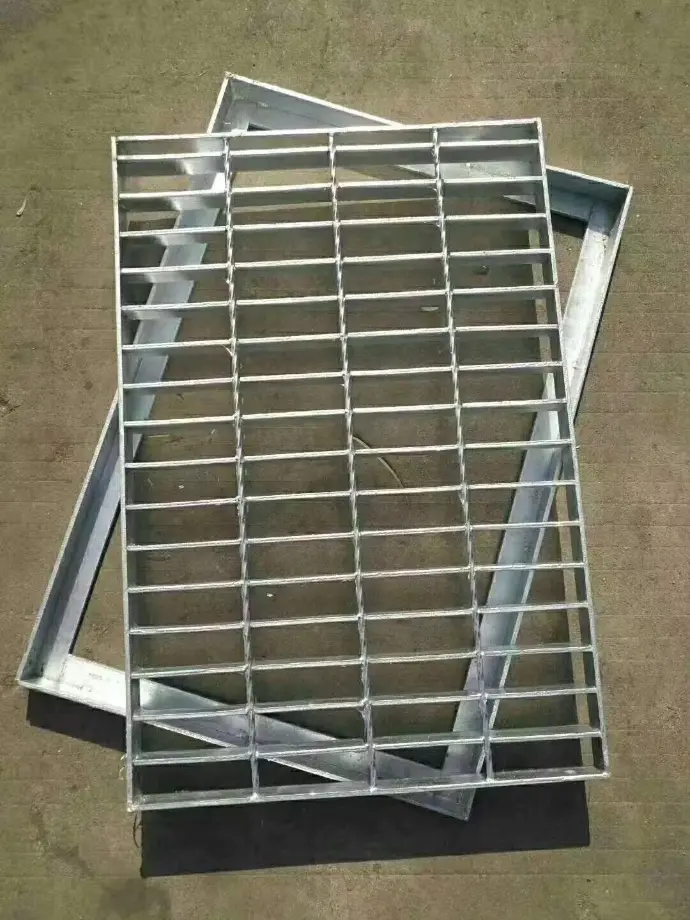 Framed steel groove cover for secure drainage ditch and channel protection in commercial facilities.